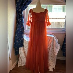 Orange knitted dress. Size M.